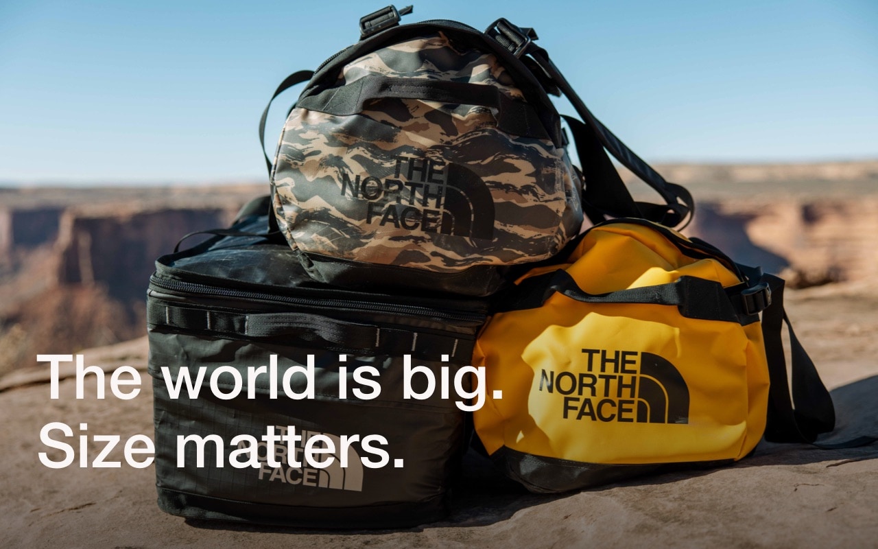 The North Face duffel bags on a raft.