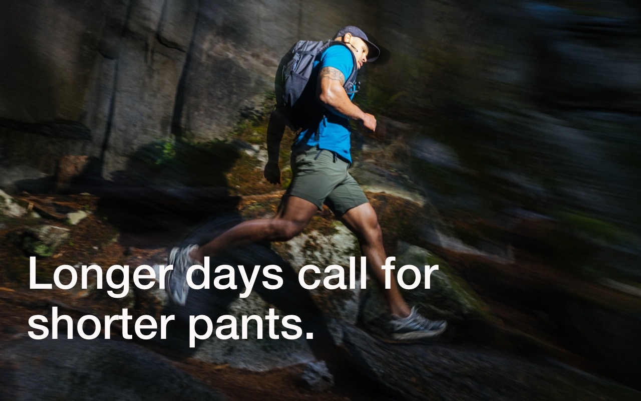 A trail runner wearing shorts from The North Face.