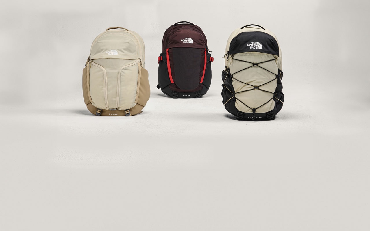 Studio shot of three backpacks from The North Face.