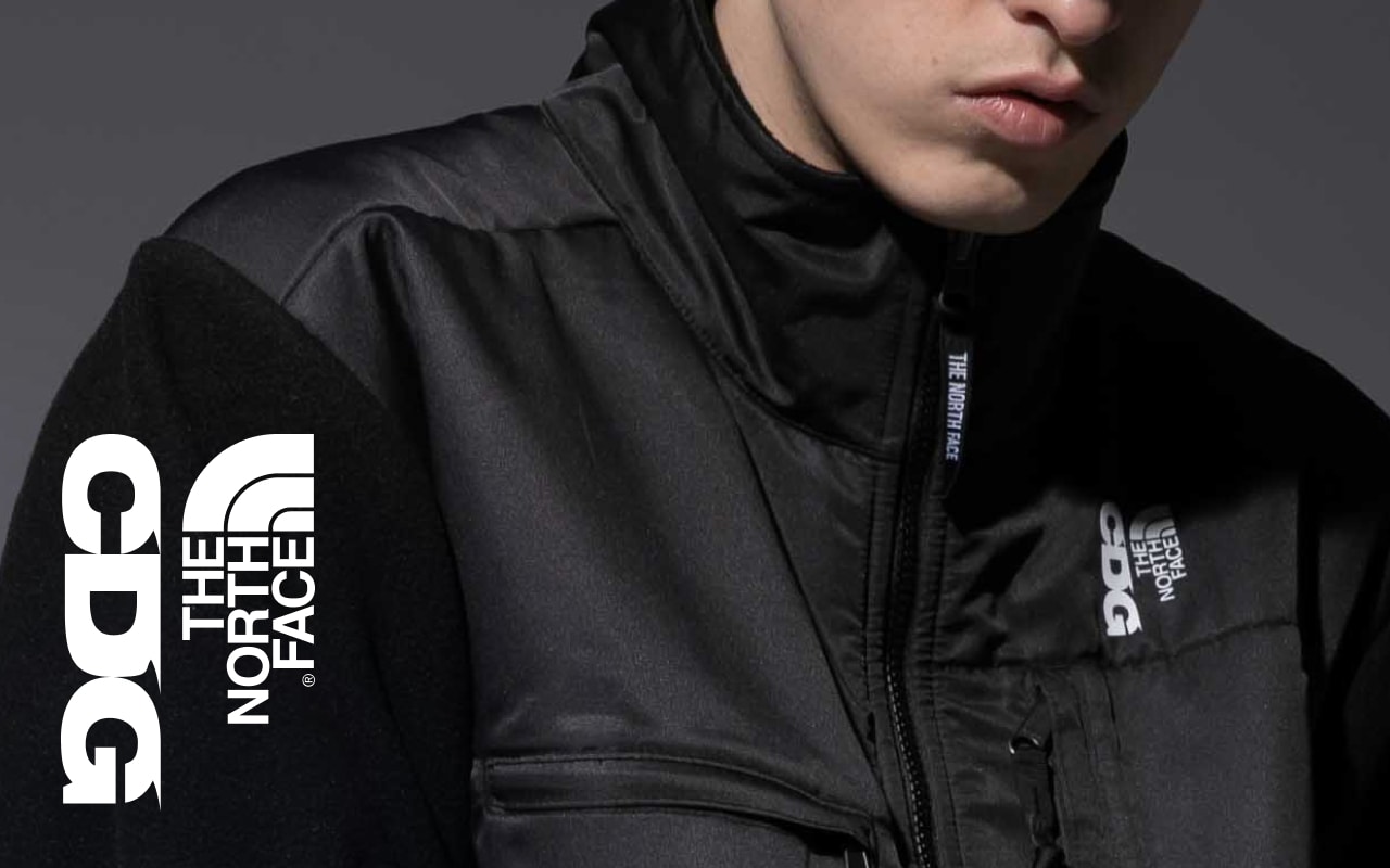 A person wearing The North Face X CDG Denali Fleece Jacket.