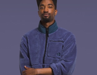 Studio shot of a man in a jacket from The North Face. 