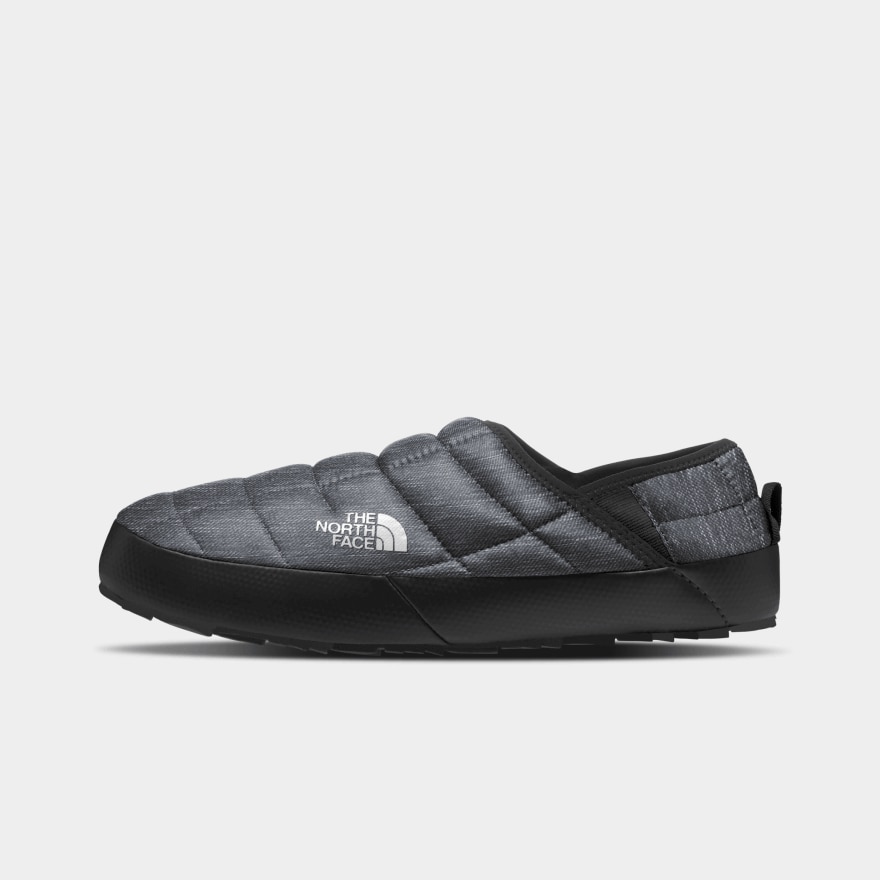 A shot of the Men’s ThermoBall™ Traction Mules V in Phantom Grey Heather Print/TNF Black 