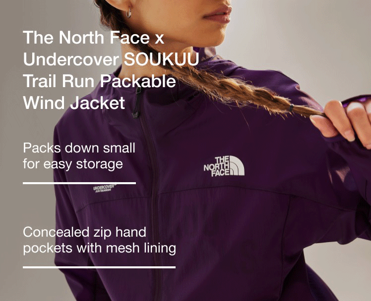 A close-up shot showing the features and packability of the SOUKUU Trail Run Wind Jacket.