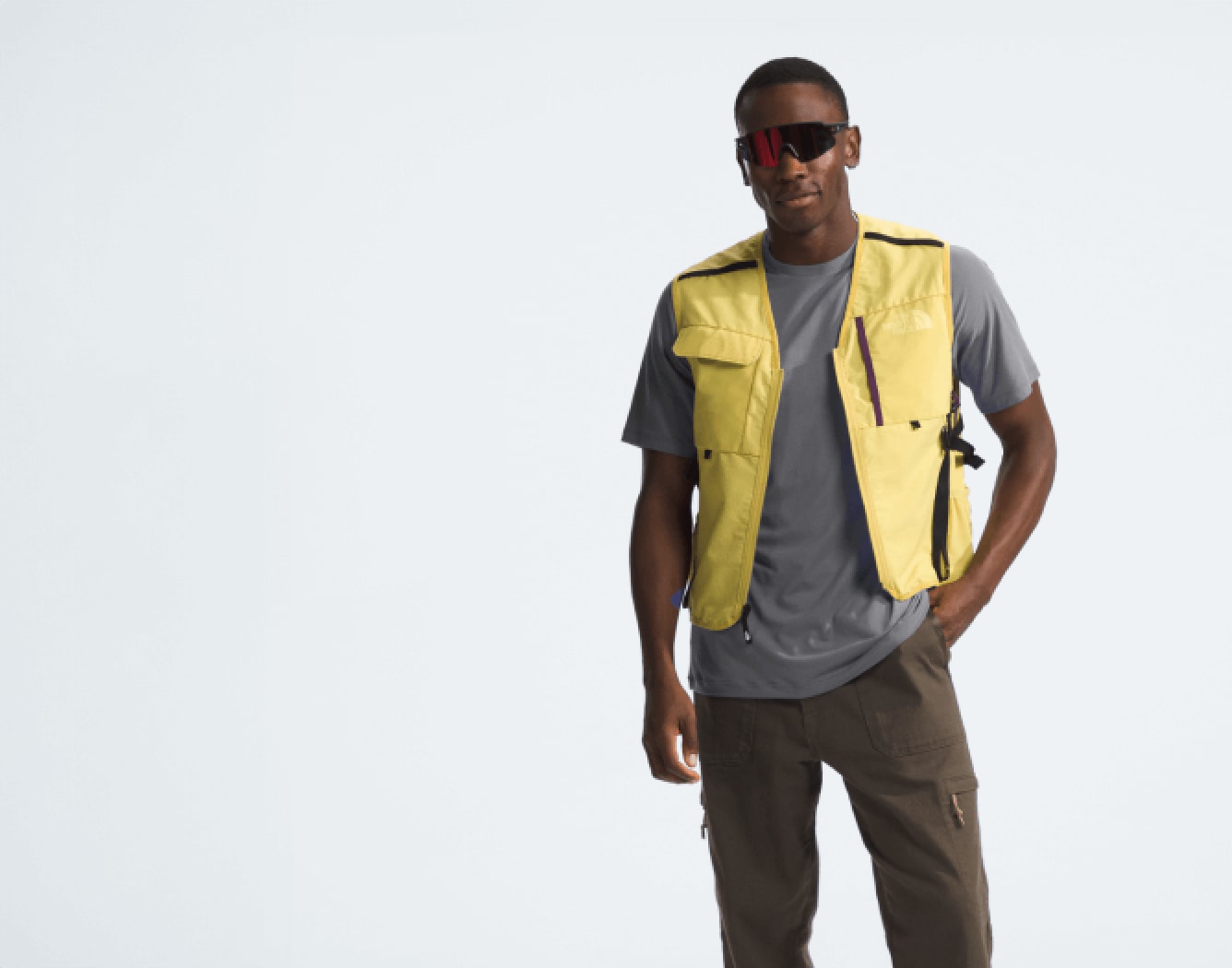 A person is wearing the Class V Utility Vest. Text reads: “Level up your layering.”
